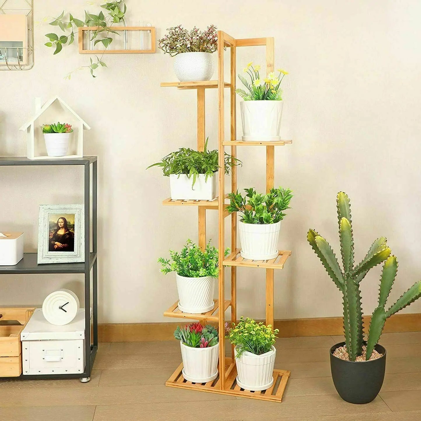 modern bamboo plant shelf for home holding multiple white pots with green and flowering plants