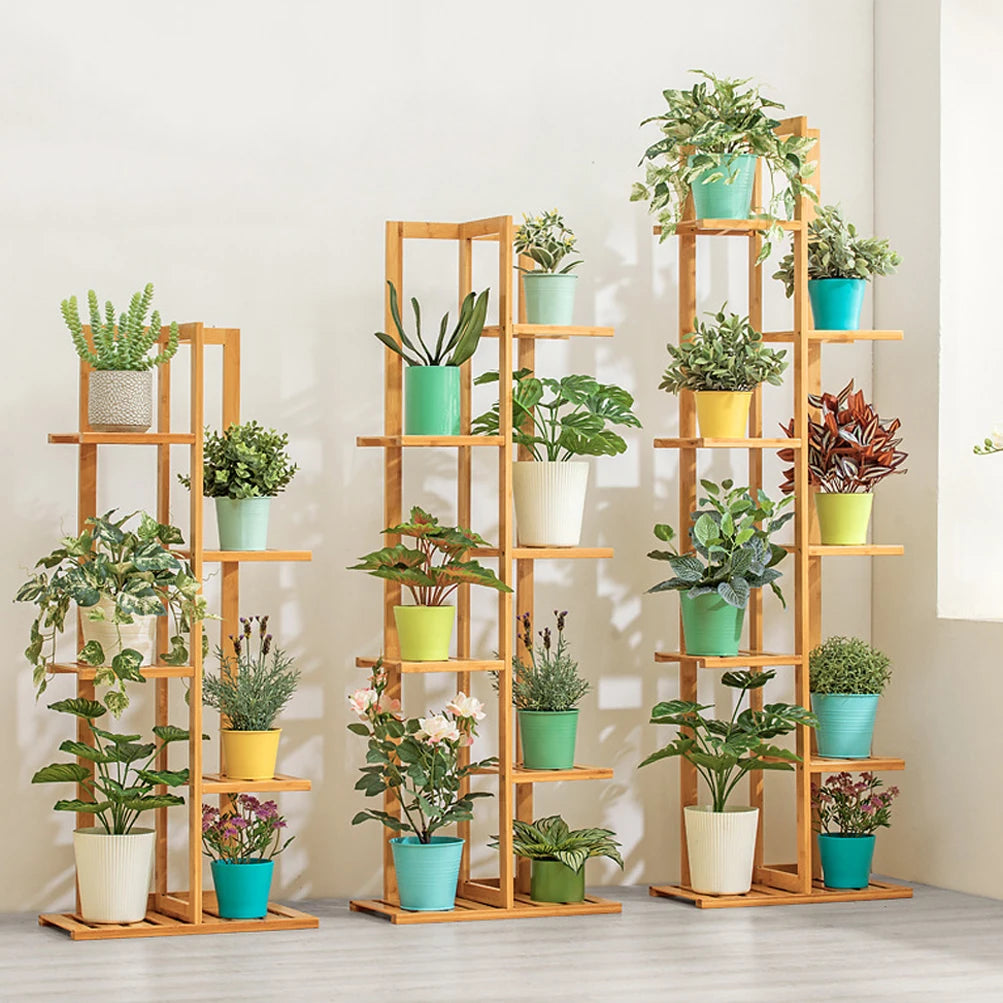 Modern bamboo plant shelf for home displaying multiple potted plants in colorful containers