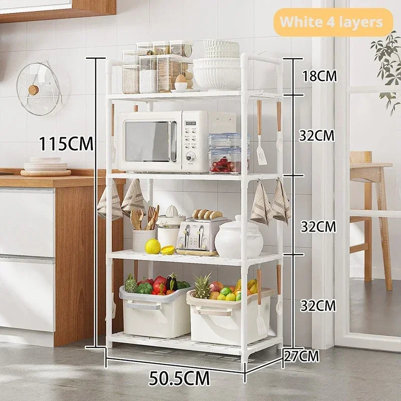 White 4 layer multi functional metal storage shelves in kitchen holding microwave, jars, fruits, and utensils
